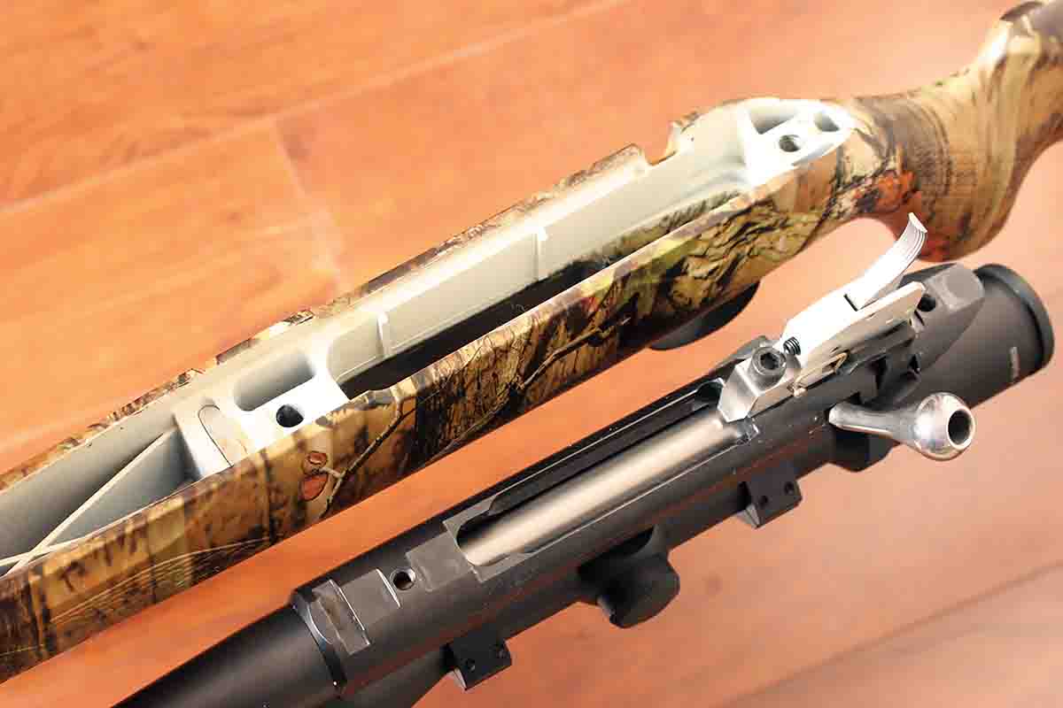 The Tikka T3 has a small recoil lug placed inside a slot in the stock, just in front of the action-screw hole, which slides into another slot milled in the bottom of the action.